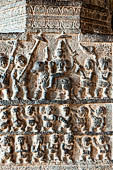 The great Chola temples of Tamil Nadu - The Airavatesvara temple of Darasuram. Pilasters inside the interior of the mandapa are decorated with small panels illustrating mythological stories in bas-reliefs. 